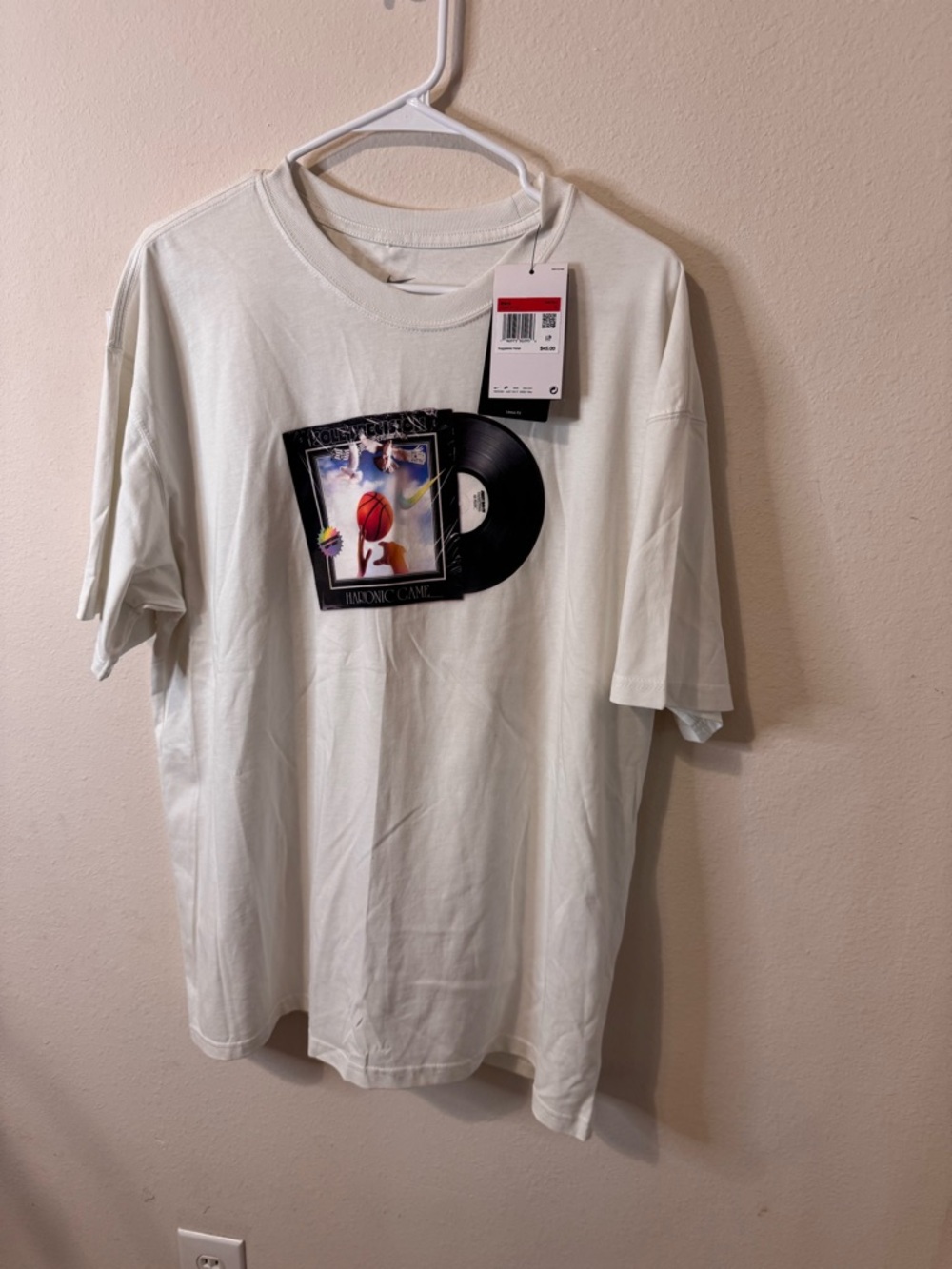 Nike White Short-Sleeve Tee with Vinyl Record Graphic